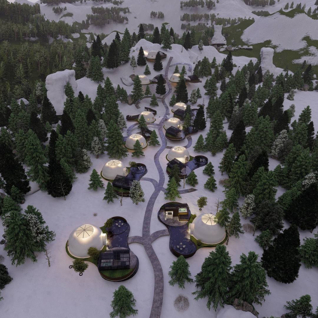 vista aérea de quartos casulo em meio a floresta com neve
